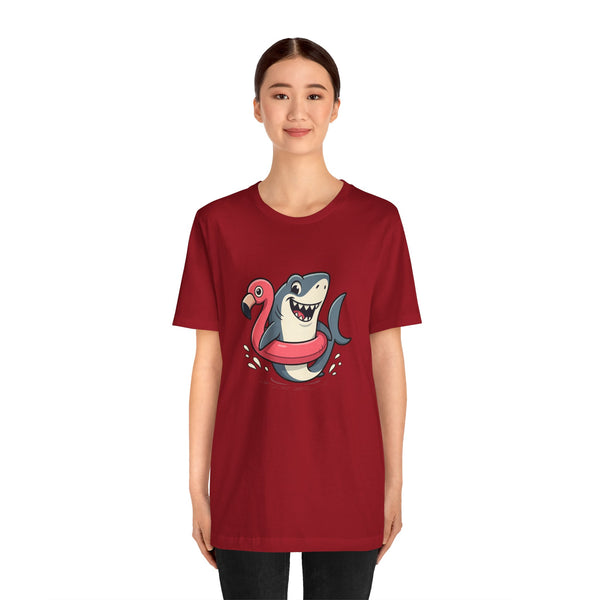 Red crewneck short-sleeve T-shirt with cartoon shark and pink flamingo graphic at center