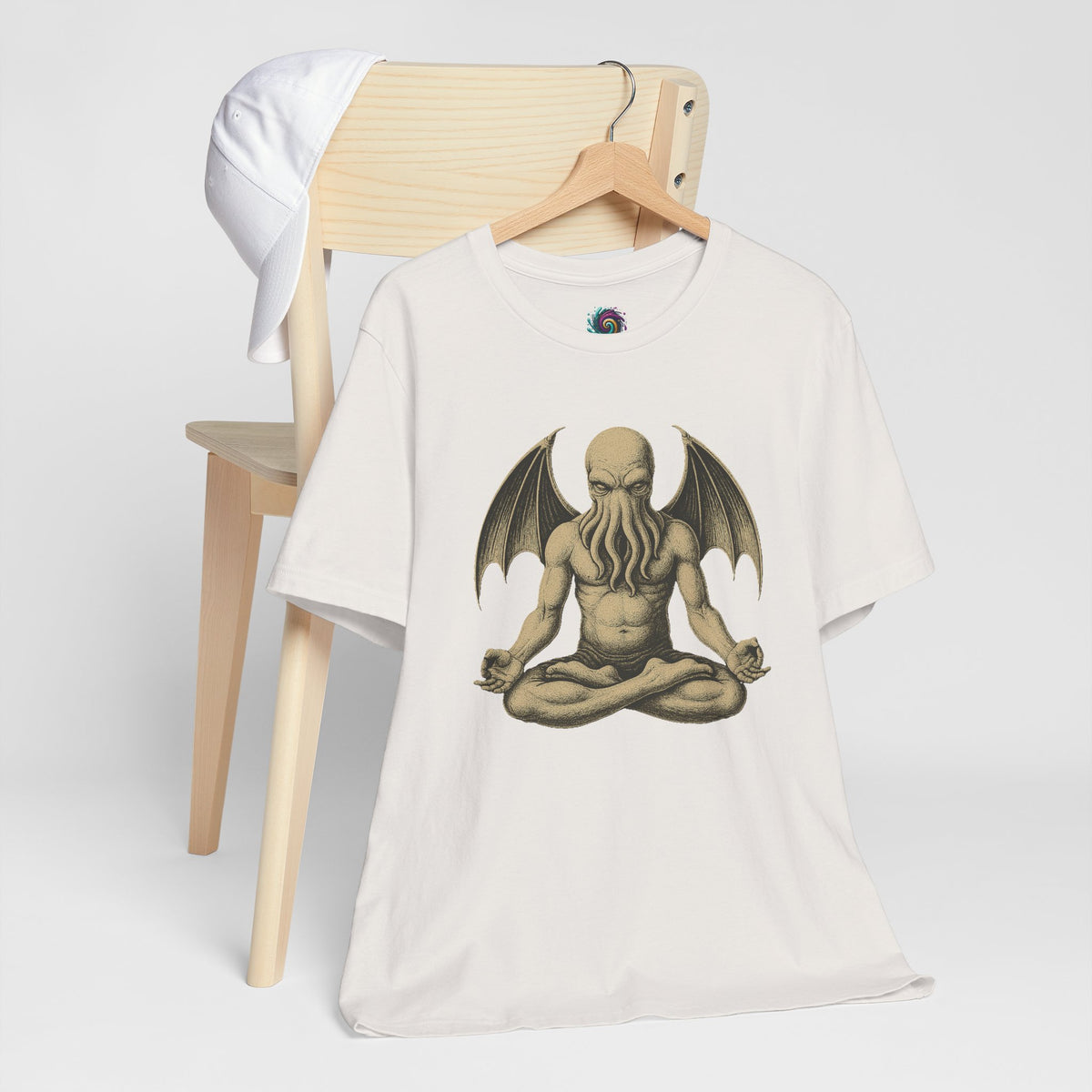 White unisex T-shirt with meditating sea monster graphic