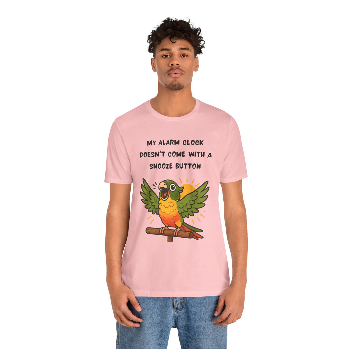 Pink parrot alarm T-shirt on model, featuring conure illustration and “snooze button” text