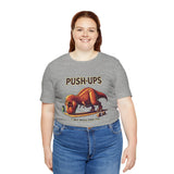 Heather gray crew-neck T-shirt with T-Rex “Push-ups” workout graphic