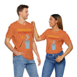 Burnt orange t-shirts on couple with “Espresso Patronum” coffee cup, steam, and wand print