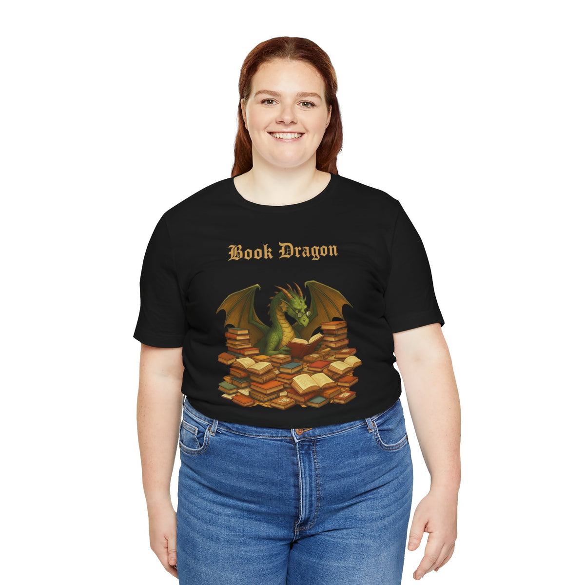Black crewneck T-shirt on a plus-size model; “Book Dragon” text and dragon books print
