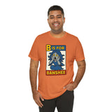 Burnt orange T-shirt with “B is for Banshee” illustrated square graphic on front