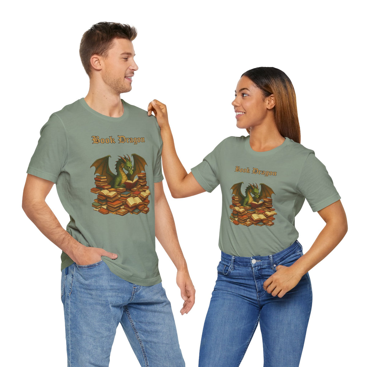 Sage green t-shirt with dragon reading books design, worn by two people