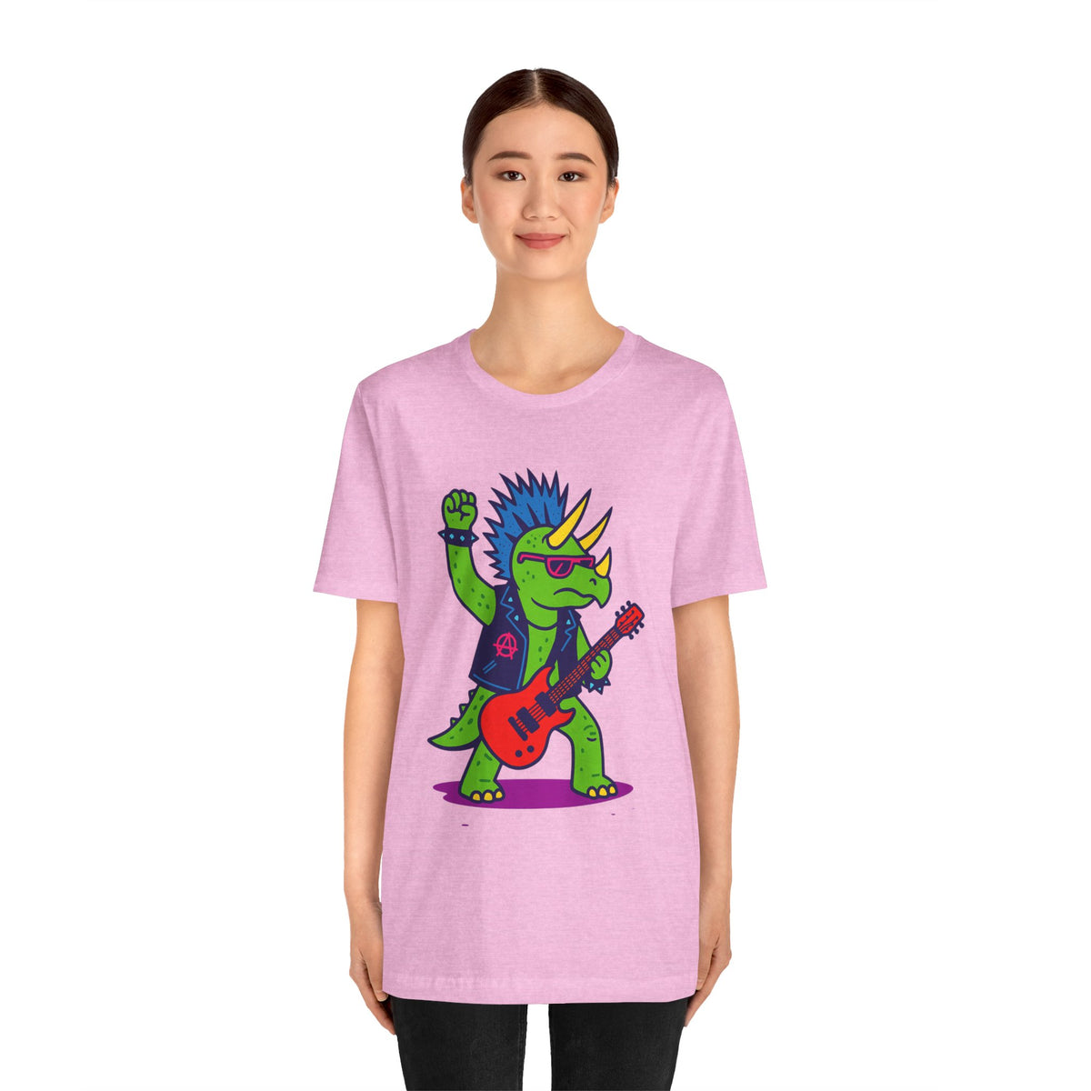 Heather pink crewneck t-shirt with punk triceratops holding a red electric guitar