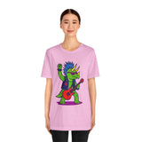 Heather pink crewneck t-shirt with punk triceratops holding a red electric guitar