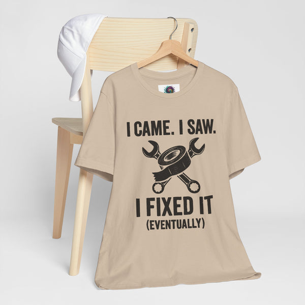 Beige short-sleeve crewneck T-shirt with “I came. I saw. I fixed it (eventually)” graphic