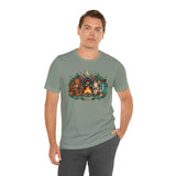 Sage green crewneck T-shirt with colorful campfire cryptid graphic on the chest
