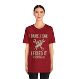 Maroon crew-neck T-shirt with DIY tools print and “I Came I Saw I Fixed It (Eventually)”
