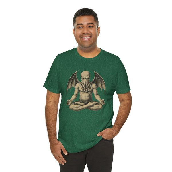 Green unisex T-shirt with centered meditating monster artwork on the chest