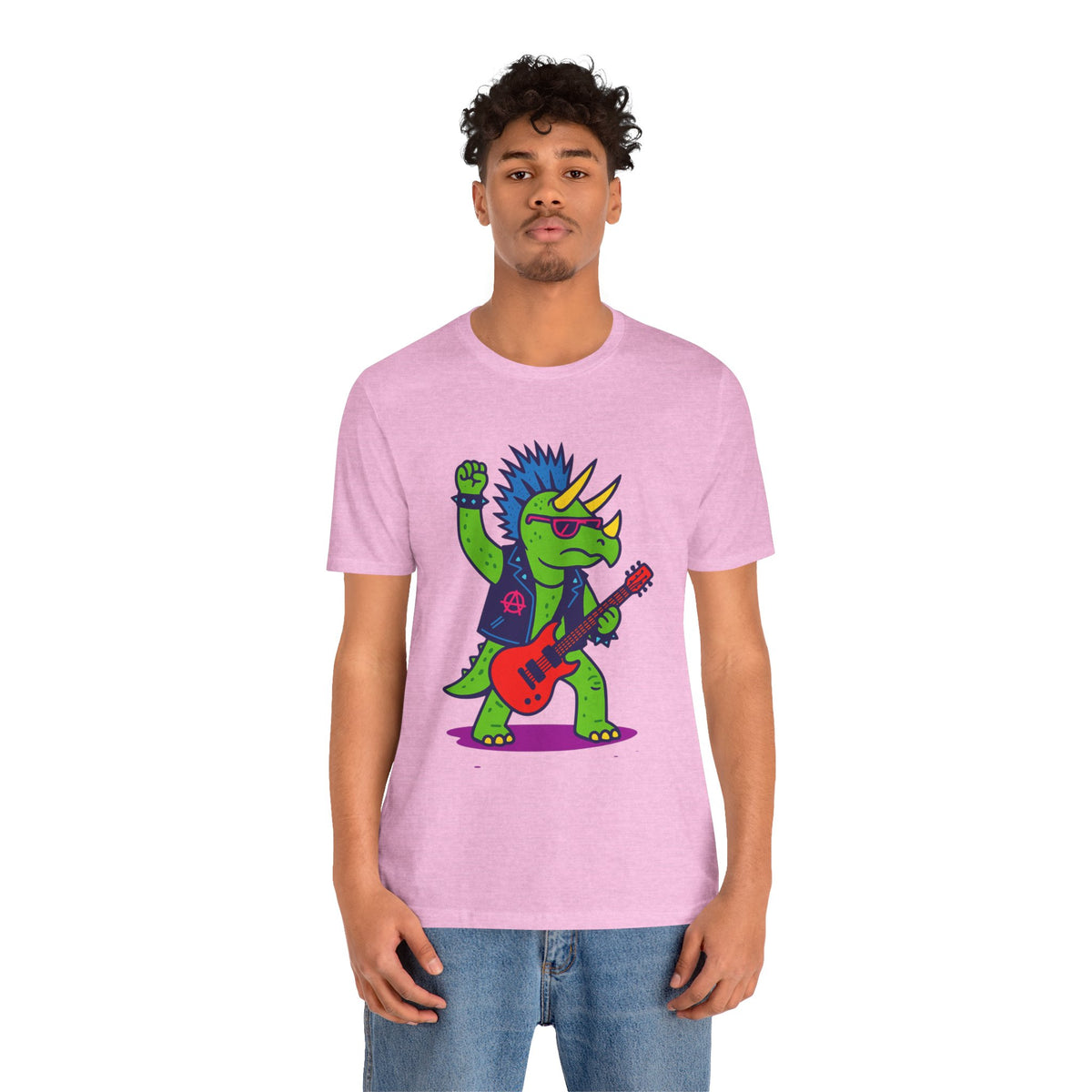 Heather pink crewneck t-shirt with front graphic of punk triceratops playing electric guitar