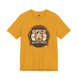 Mustard yellow crewneck t-shirt with pumpkin-spice themed badge graphic on the chest