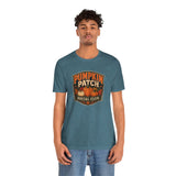 Teal heather T-shirt with Pumpkin Patch Social Club front graphic, worn by model