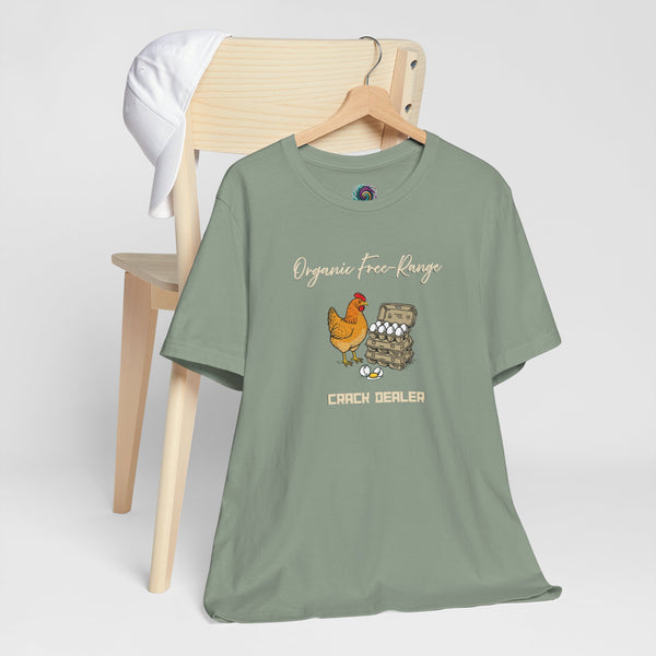 Green crew-neck graphic T-shirt on hanger with chicken-and-eggs “Crack dealer” print
