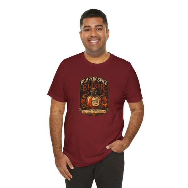 Maroon crew-neck T-shirt with pumpkin elixir front graphic on model