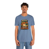 Steel blue crewneck T-shirt with pumpkin graphic on chest, model wearing it