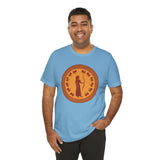 Sky blue crewneck T-shirt with large orange circular Greek-style goddess graphic