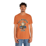 Orange crewneck T-shirt with All-Nighter Club coffee cup graphic on front