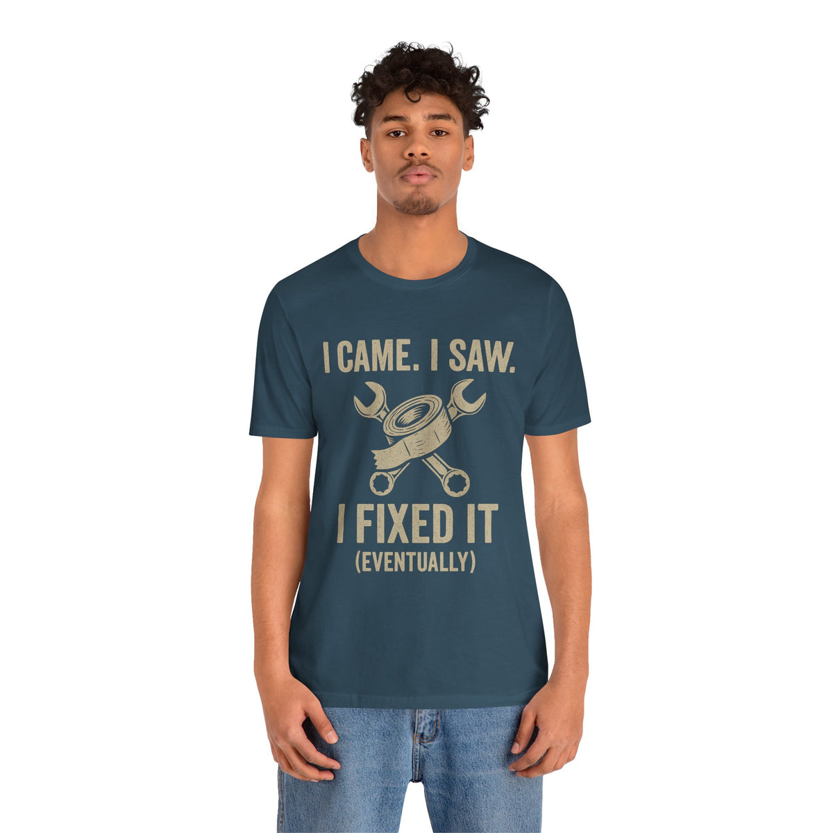 Teal crewneck T-shirt with gold “I came, I saw, I fixed it (eventually)” mechanic tools print