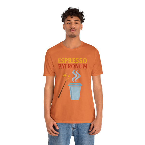 Burnt orange t-shirt on model with “Espresso Patronum” coffee cup, steam, and wand graphic