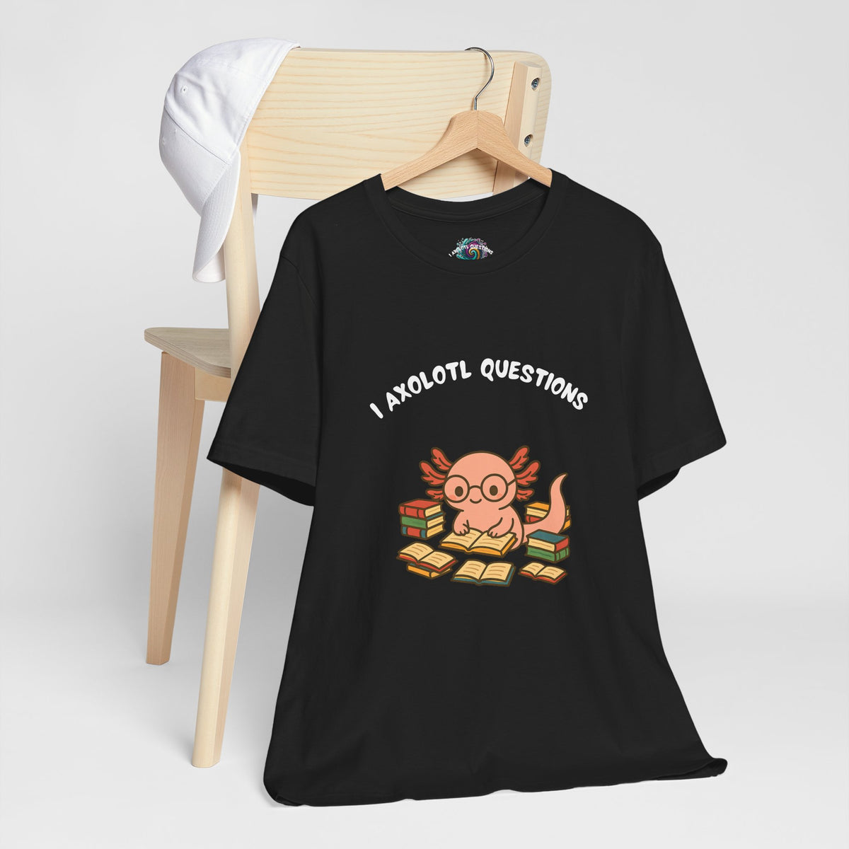 Black crewneck t-shirt with axolotl reading graphic and 'Axolotl Questions' text