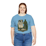 Light blue crewneck T-shirt with green shrub and cactus graphic on front
