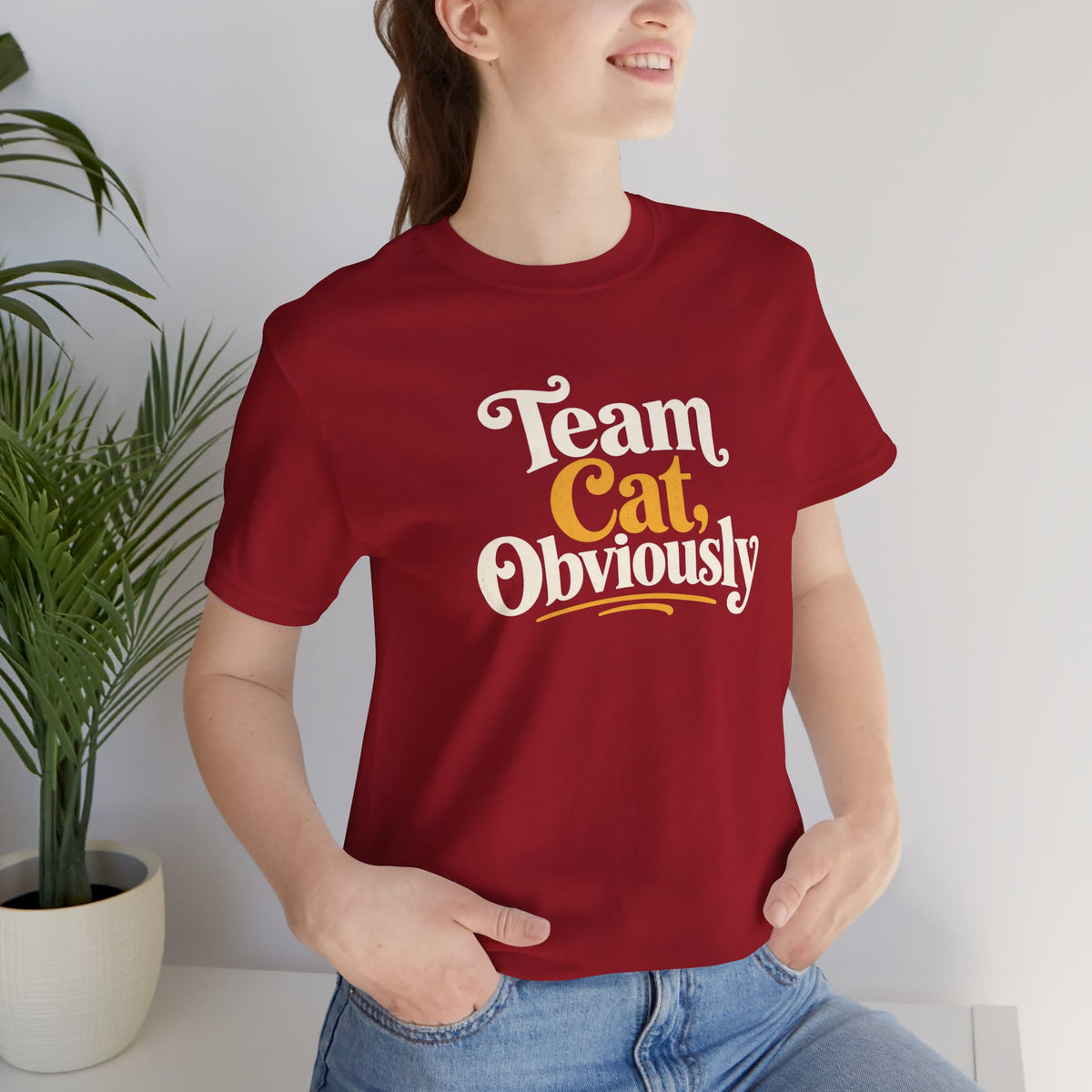 Red crew neck T-shirt with 'Team Cat, Obviously' slogan graphic on the chest.