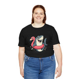 Black T-shirt featuring shark and flamingo floatie front print, crew neck