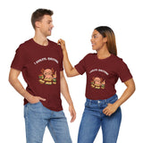 Two people wearing burgundy T-shirts with axolotl reading graphic and “I axolotl questions”