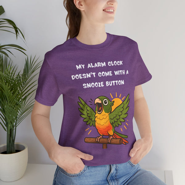 Purple crew-neck t-shirt worn by model; parrot graphic with alarm clock slogan front