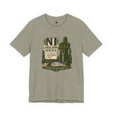 Heather stone crew-neck T-shirt with green gardening-themed emblem graphic on the chest