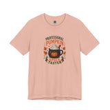 Peach pink pumpkin spice graphic t-shirt with “Professional Pumpkin Spice Taster” print