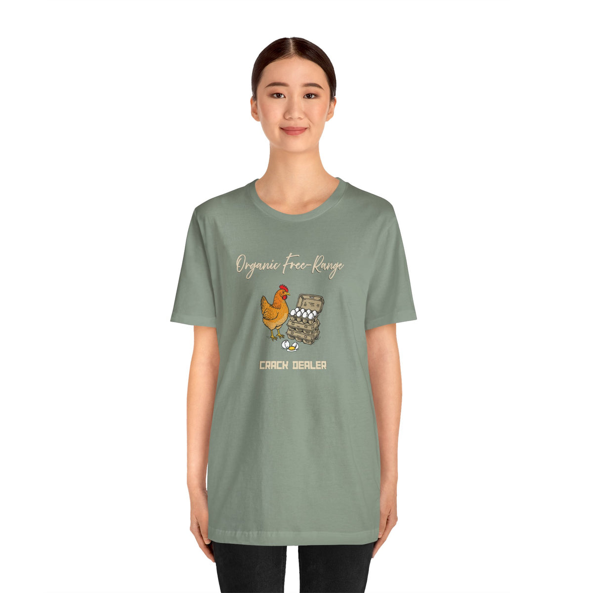 Green crew-neck graphic T-shirt worn by model; chicken-and-eggs “Crack dealer” print
