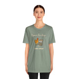 Green crew-neck graphic T-shirt worn by model; chicken-and-eggs “Crack dealer” print