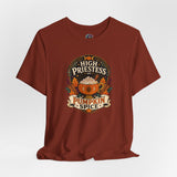Brown crew-neck t-shirt with “High Priestess of Pumpkin Spice” front graphic
