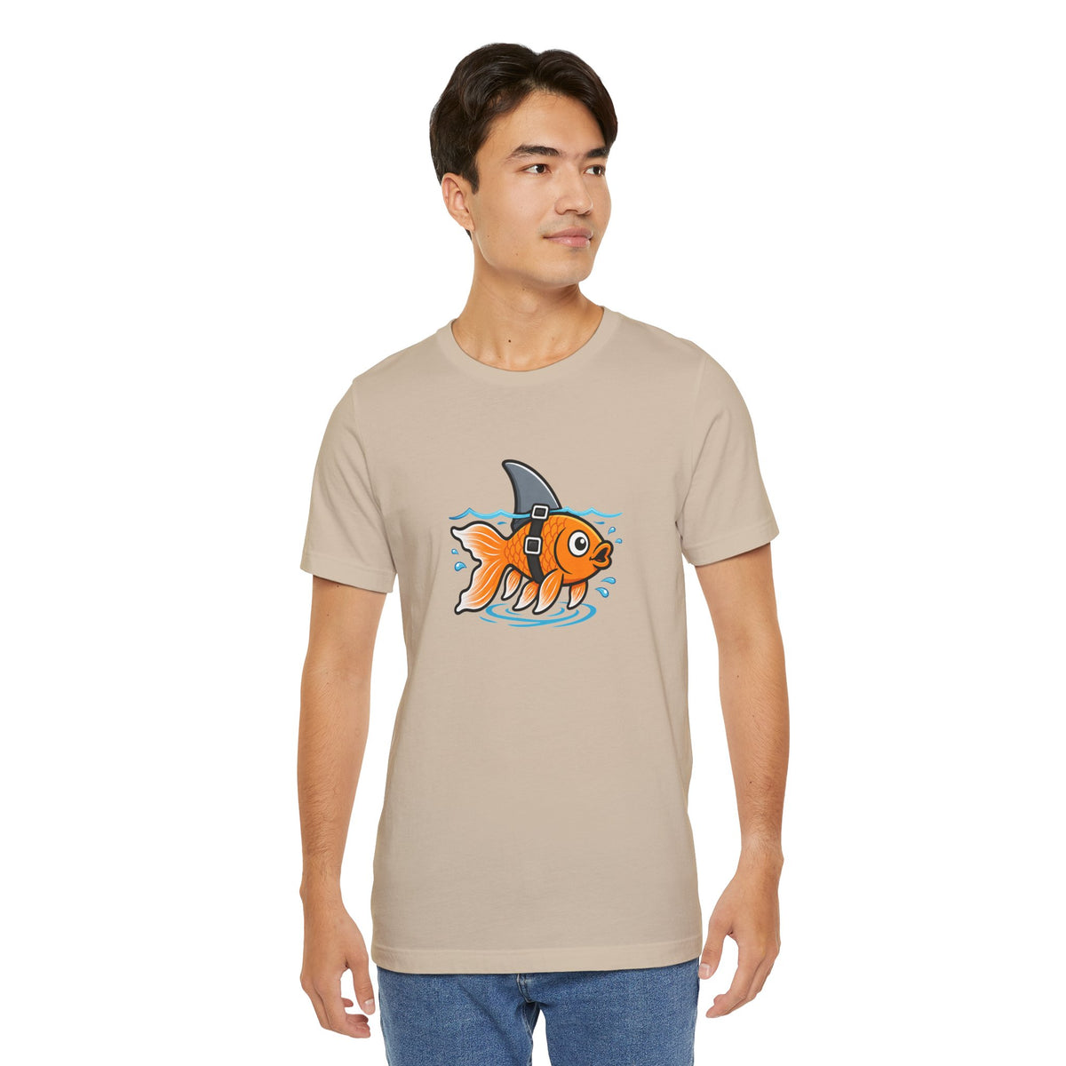Tan crew-neck T-shirt with orange fish-and-shark graphic on chest