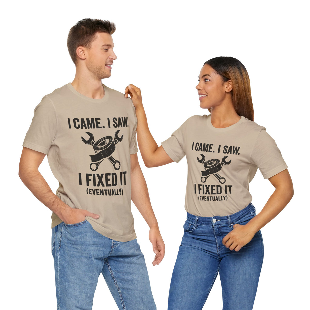 Two models wearing beige crewneck graphic T-shirts with repair quote on the front