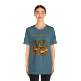 Teal heather Book Dragon t-shirt with centered dragon over stacked books front print