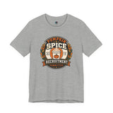 Heather gray crewneck t-shirt with pumpkin-spice themed badge graphic on the chest