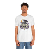 White unisex t-shirt worn by model, centered goth cat moon graphic.