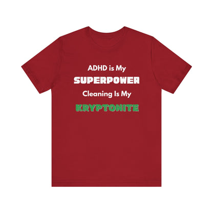 ADHD Cleaning Kryptonite T-Shirt – Funny Shirt for Neurodivergent Humor in canvas red with ADHD superpower and kryptonite design