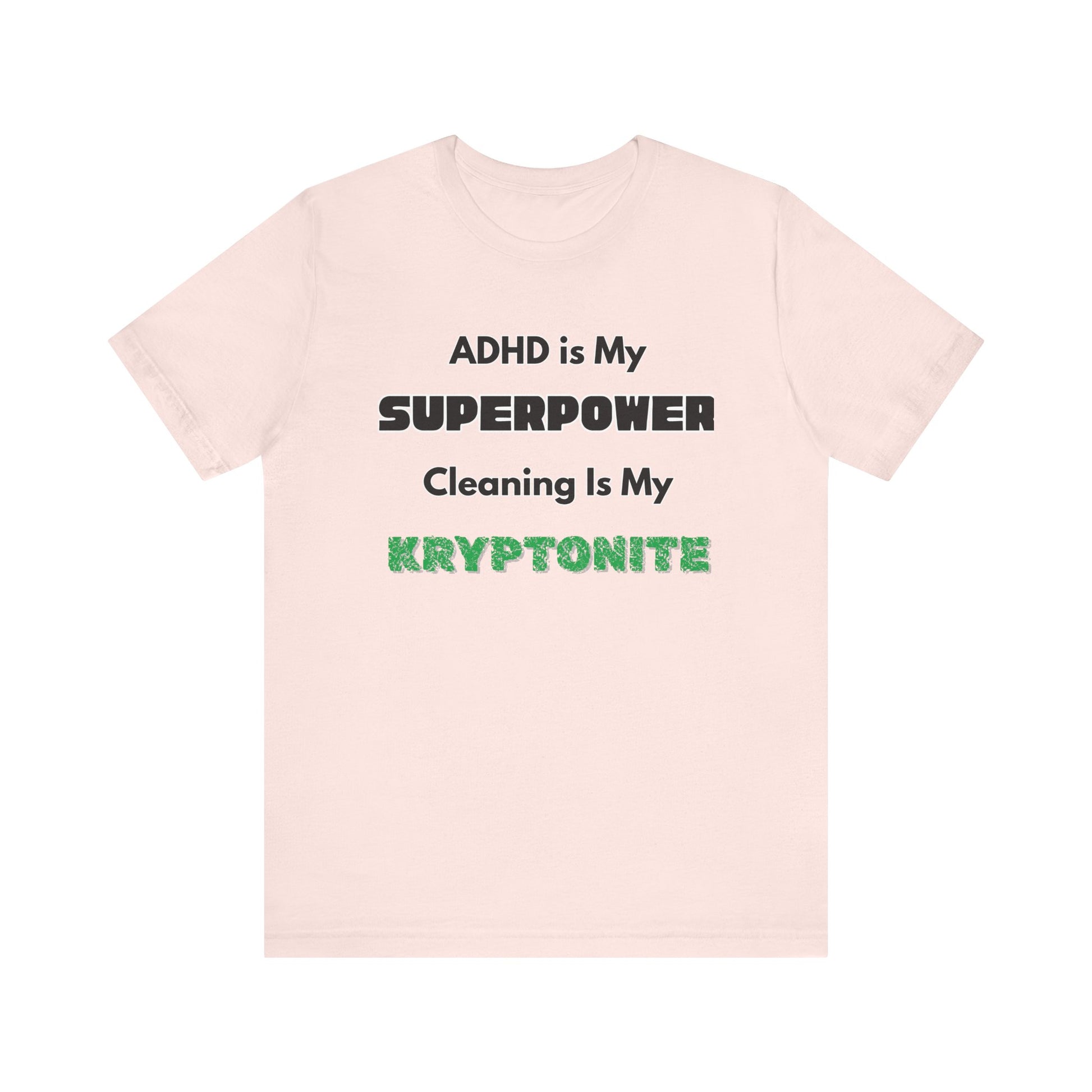 ADHD Cleaning Kryptonite T-Shirt – Funny Shirt for Neurodivergent Humor in soft pink with comic-style ADHD phrase