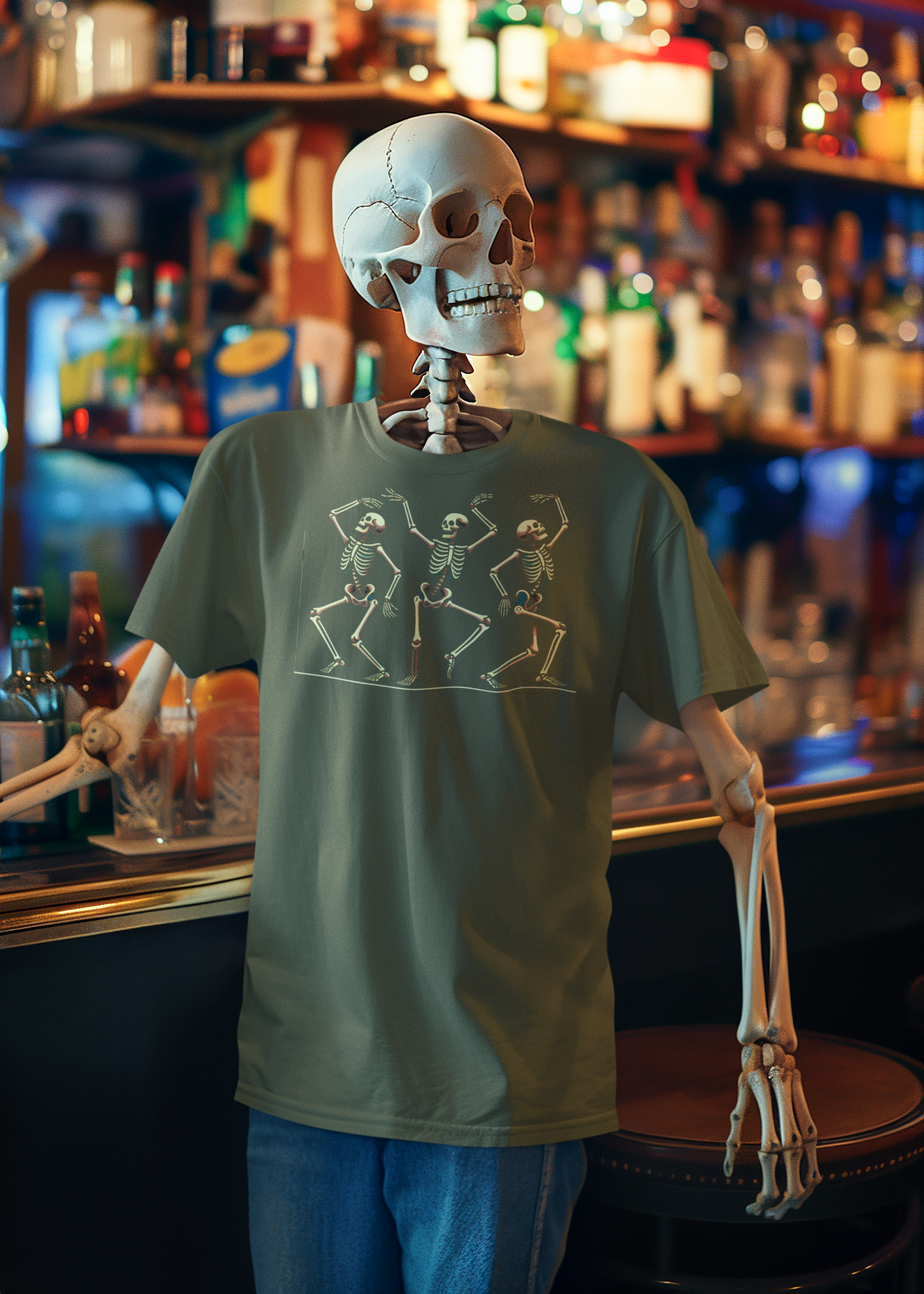 A Skeleton standing at a bar wearing the Dancing Skeleton Shirt in heather slate—features retro dancing skeleton trio for a spooky season vibe.