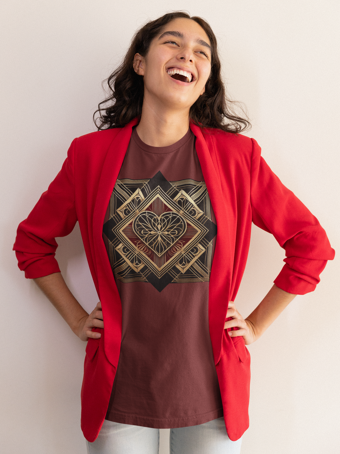 Art Deco Heart T-Shirt – Romantic Valentine’s Day Graphic Tee shown worn by a woman laughing with hands on hips, featuring an elegant gold art deco heart design on a cardinal red shirt styled for a modern romantic look.