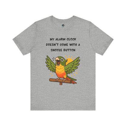 Parrot Alarm Clock T-Shirt – Funny Parrot Wake-Up Call Tee in Athletic Heather, showing the vibrant squawking parrot illustration, yellow sunburst accents, and humorous alarm-clock text clearly displayed across the chest.