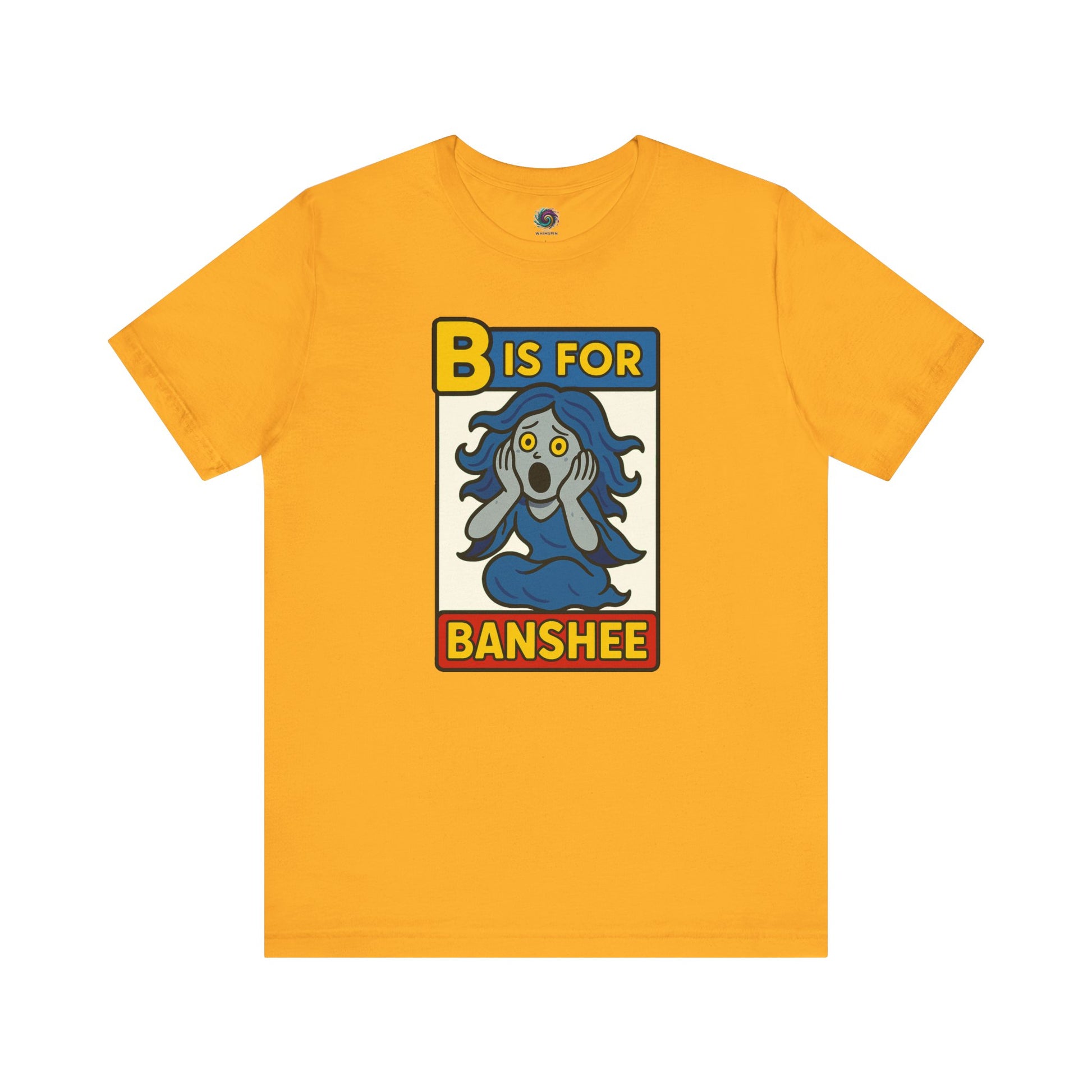 Flat lay of B is for Banshee Shirt in Gold with bold yellow background and spooky cute banshee illustration
