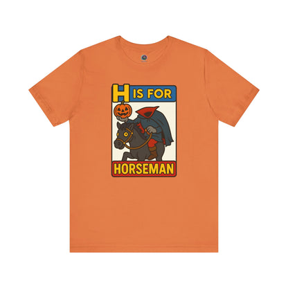 H is for Horseman T-Shirt – Headless Horseman Halloween Tee in burnt orange, flat lay alphabet monster design, funny headless horseman shirt