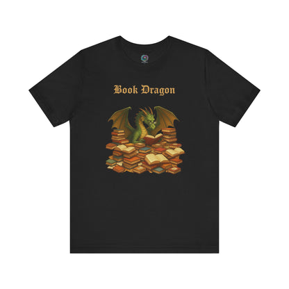 Book Dragon T-Shirt – Funny Book Lover Shirt printed on black, with a fantasy dragon reading amid a stack of books