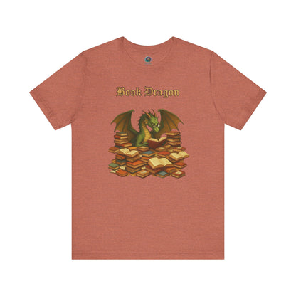 Book Dragon T-Shirt – Funny Book Lover Shirt on heather clay with a book-hoarding dragon in warm tones