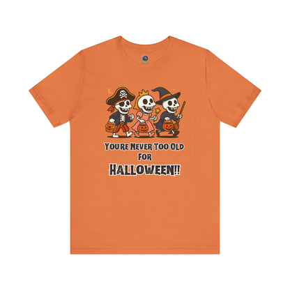 Never Too Old for Halloween T-Shirt – Funny Adult Halloween Shirt in burnt orange, displayed as a flat lay with the bold graphic front and center; great for Halloween enthusiasts.